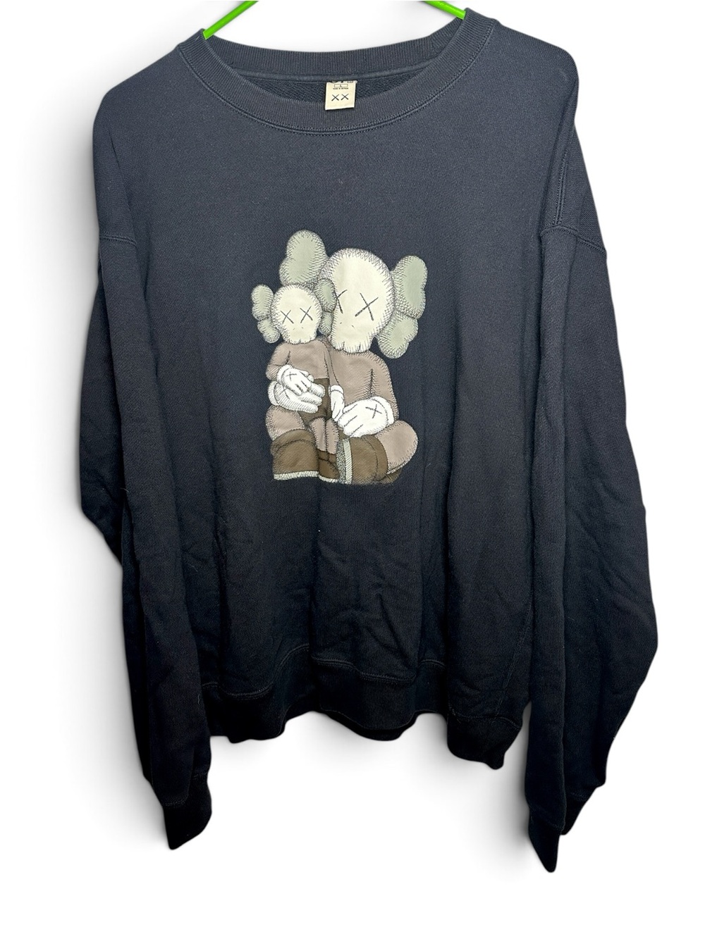 Uniqlo Black Crewneck Sweater with Neutral Character Graphic